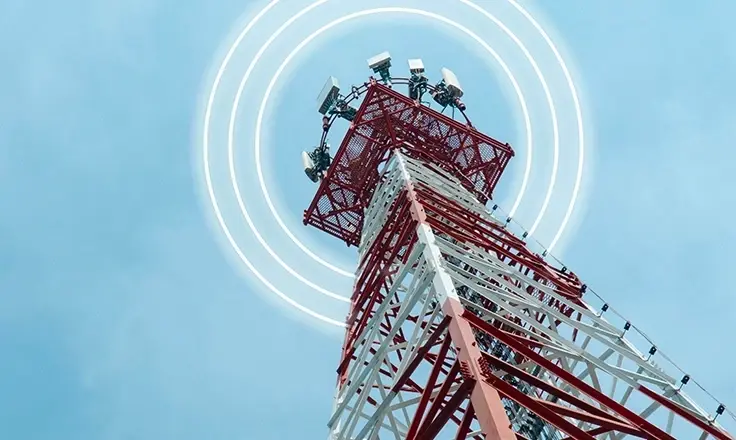 Low-angle view of a red and white telecommunications tower emitting white signal waves.