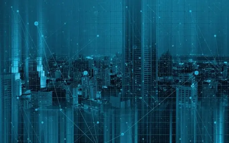 Abstract digital network overlay on a night cityscape skyline.