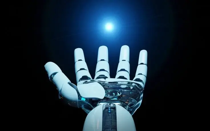 A white robotic hand reaching toward a bright blue light source against a solid black background.