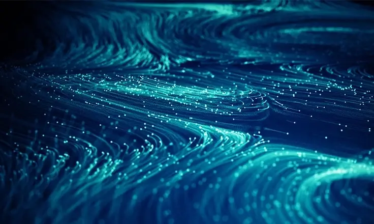Abstract digital background of flowing teal and blue fiber optic light trails and glowing particles in swirling patterns.