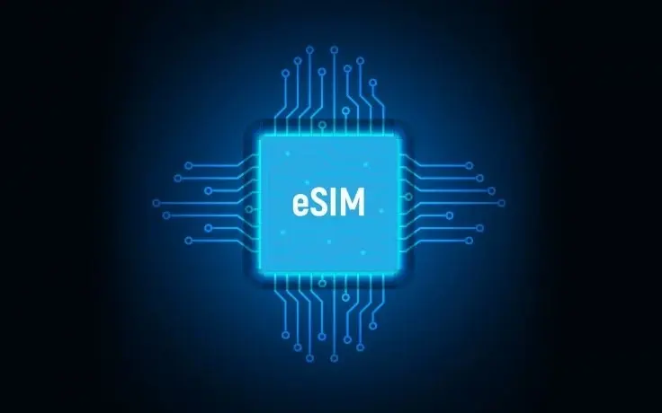 A blue glowing digital chip with the text "eSIM" and visible circuit board patterns on a dark background.