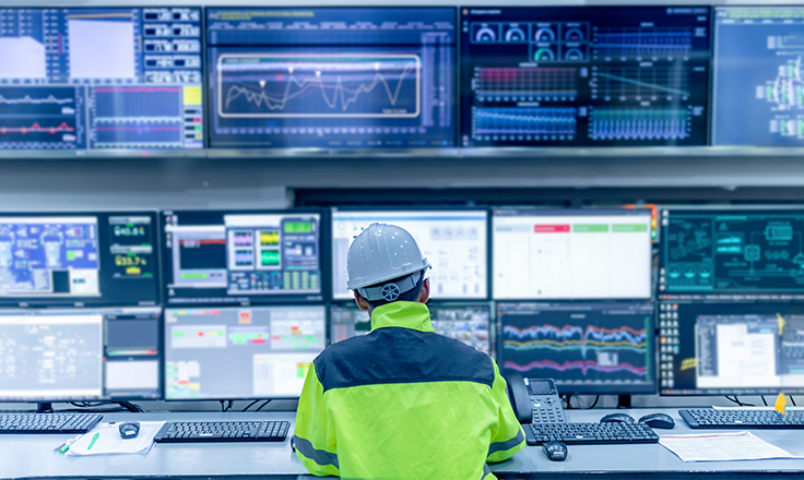 NOC operator in front of screens